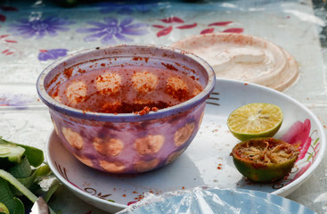 used lemon in serving tray, India