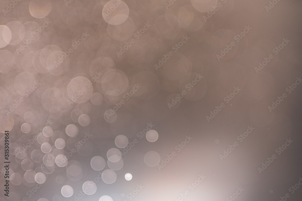 Poster abstract bokeh from light and water spray in backgrounds of various colors