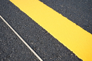 Fototapeta premium Yellow traffic line After completing the construction