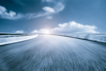 Skyline of Asphalt Pavement and Blue Sky and White Cloud