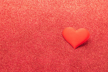 Red heart symbol of love on a shiny background. Valentines day concept. Horizontal frame copy space.