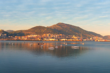 boats in El Abra in Getxo with beautiful sunrise golden light