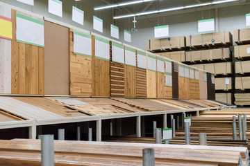 Selling wooden planks at a hardware store