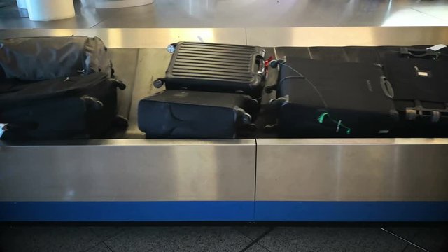 4k footage of suitcase or luggage with conveyor belt in the international airport.