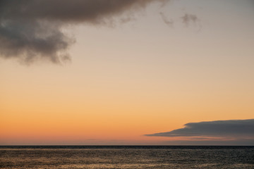 Photo of the sea horizon at sunset on a sunny day