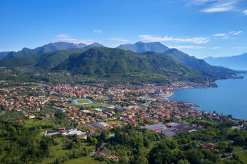 Fototapeta na wymiar The city of Salo, Italy. Lake Garda, blue sky, mountains