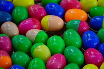 Fototapeta na wymiar Plastic easter eggs with a prize inside