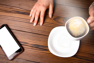 female hands and coffee