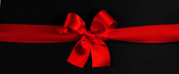 Red bow on black