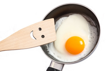 pan in hands on a white background