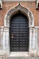 Old traditional door in Venice, Italy