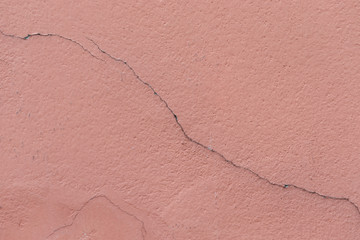 cracked line on  pink wall