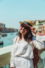 woman portrait in sunny summer day grand canal venice italy on background