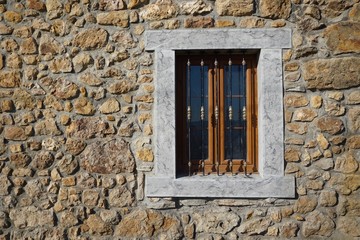 window on the old facade of the house in the street in Bilbao city Spain