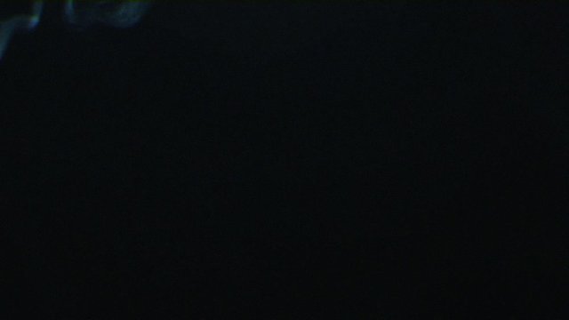 A scary VHS text, No way out, appearing on the screen with a smoke, typical of a horror flick.