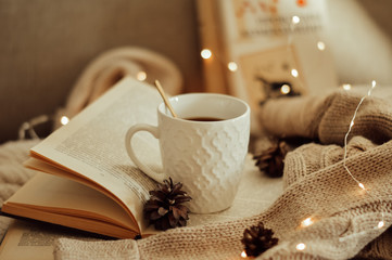 cup of coffee and old book