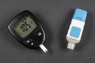 Glucometer (Sugar measuring device); Modern electronic device that shows sugar level in blood.