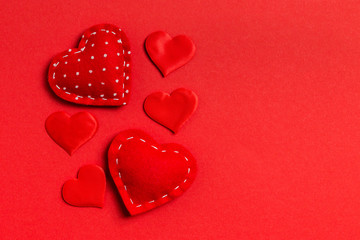 Top view composition of red hearts on colorful background. Romantic relationship concept. Valentaine's Day