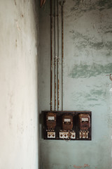 Old fuse box in the house vertical