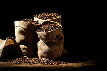 desk of free space and coffee beans in sacks. 