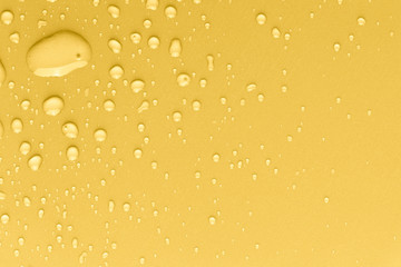 Drops of water on a color background