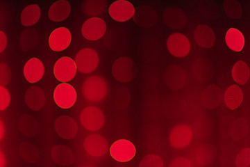 Bright red background with soft round bokeh lanterns