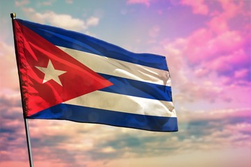 Fluttering Cuba flag on colorful cloudy sky background. Prosperity concept.