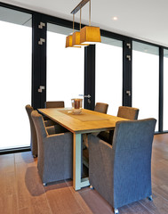Elegant and luxury dining table with great windows