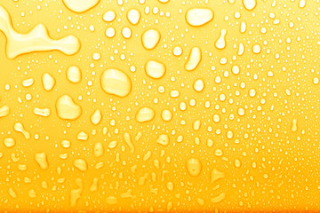Drops of water on a color background. Selective focus. Yellow. Toned