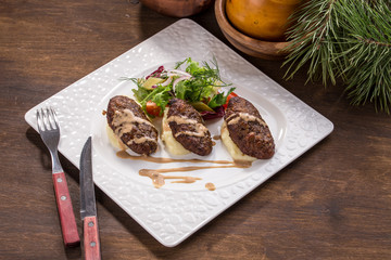Beef Meat Balls or Rissole with mashed potato on wooden table