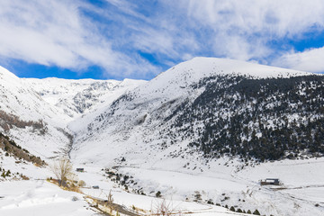 Fototapeta na wymiar Panorama of winter snow landscape mountain view in Andorra, valley of Pyrenees mountains, South Europe. Andorra is famous tourist travel destination. Luxury amazing resort for skiing and winter rest