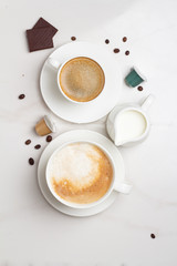 cup of coffee on wooden background