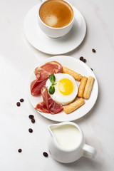 black coffee and fried eggs
