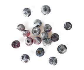 frozen blueberries isolated on white background