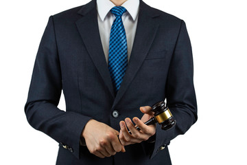 A man in a suit and holding things in his hands