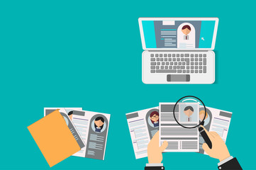 Office Recruiter Recruits Desk Resume Candidates for Vacancy. curriculum vitae is reviewed by office worker