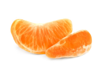 Naklejka na ściany i meble Fresh juicy tangerine segments isolated on white