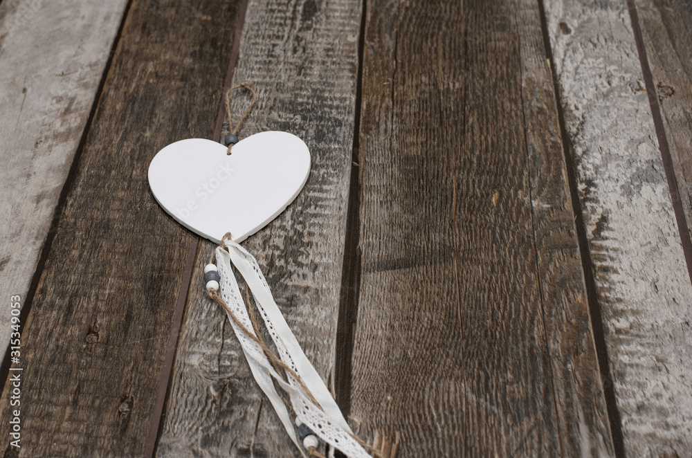 Wall mural heart shape on wooden background