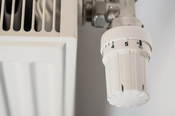 Photo of a heating radiator with temperature regulator