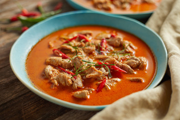 Dried red pork coconut curry, Thai cuisine.