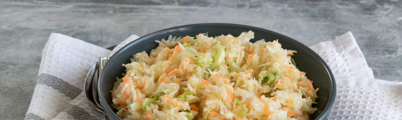 Fresh salad of raw cabbage, leeks and carrots, multivitaminico natural food