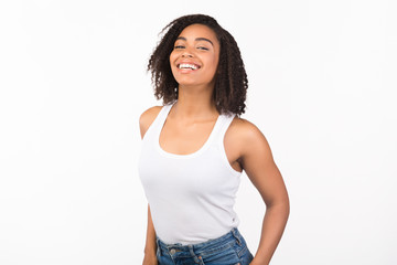 Close up portrait of laughing afro woman