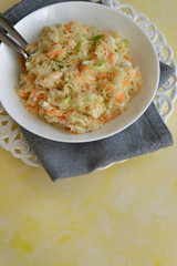 Fresh salad of raw cabbage, leeks and carrots, multivitaminico natural food
