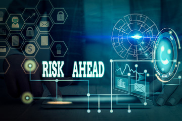 Writing note showing Risk Ahead. Business concept for A probability or threat of damage, injury,...
