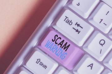 Handwriting text writing Scam Warning. Conceptual photo caution of unsolicited email claims the...
