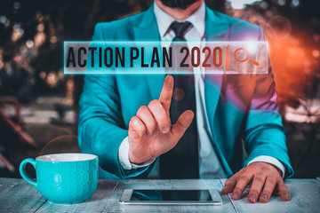 Handwriting text writing Action Plan 2020. Conceptual photo to do list contain number of things be...