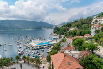 Naklejka na ściany i meble tourist beach town of Montenegro, historical buildings and architecture . Adriatic sea, coast