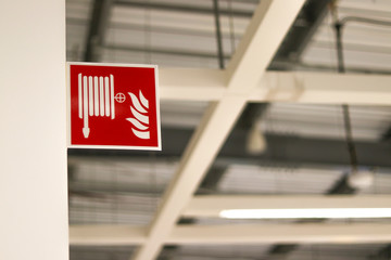 Signboard showing the point of installing a fire hose reel.