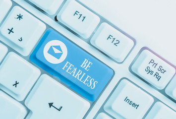 Word writing text Be Fearless. Business photo showcasing act of living in spite of those things...