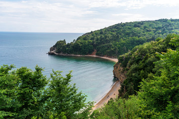 Adriatic sea, coast. summer beach holidays. mountainous terrain, rocks on the beach